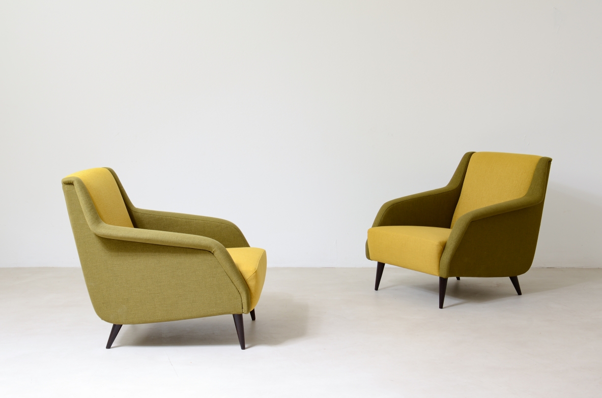 Carlo De Carli, Gio Ponti  Pair of model 802 armchairs covered in padded fabric. Designed in 1954 Cassina manufacture