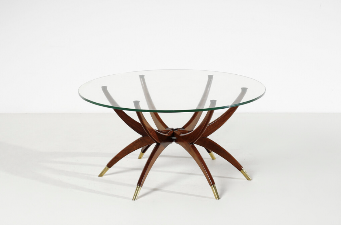 Elegant low table with 6 legs in curved wood with brass tips and cut glass top'50