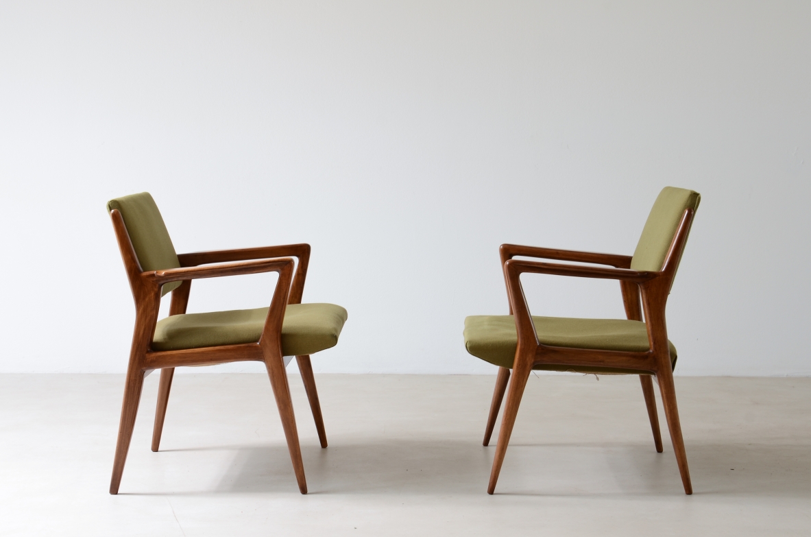 Pair of modernist walnut armchairs.  Italian manufacture 1950