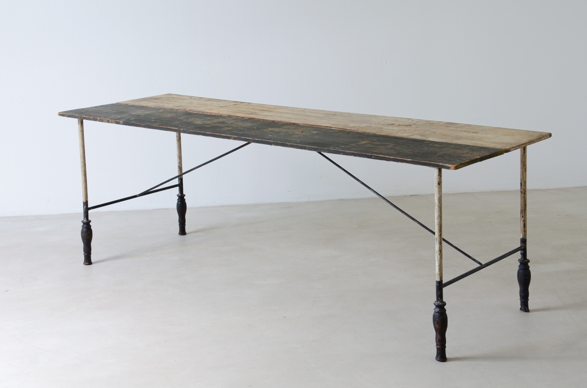 Table with iron base with turned feet and painted wooden top.  Manufacture, France ca. 1920/30.
