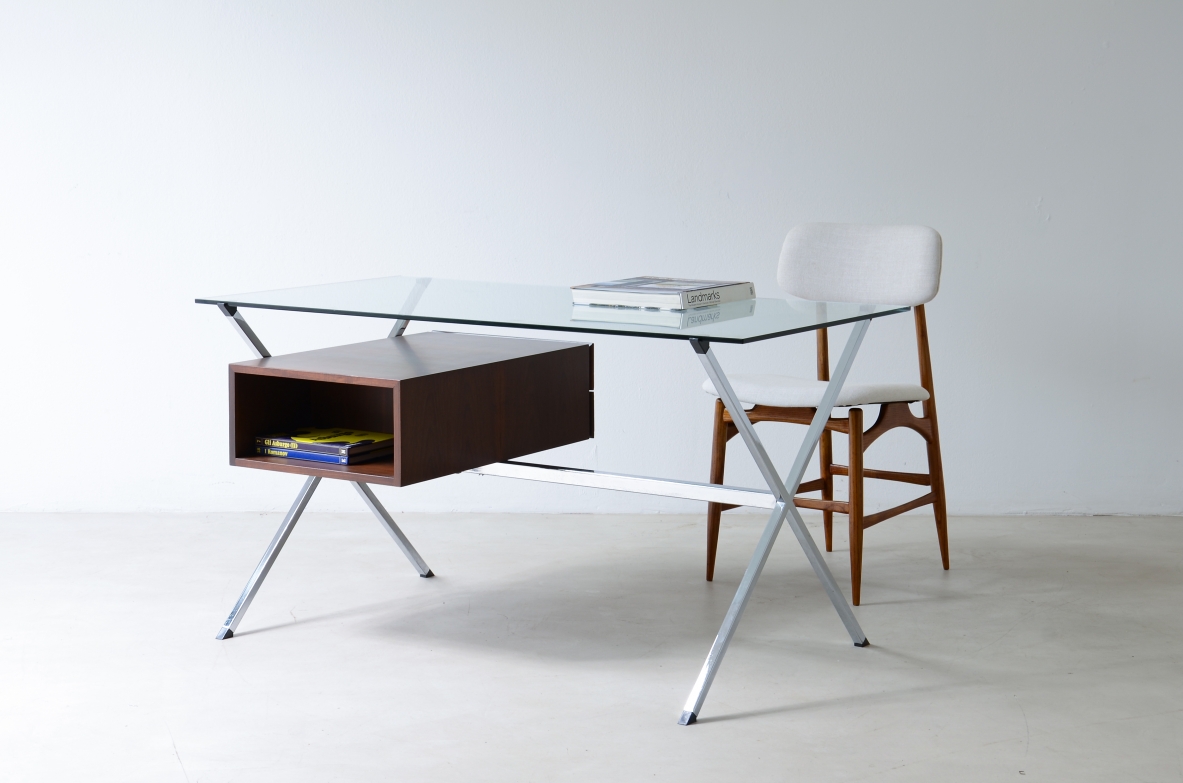 Italian modernist writing desk by Colli Torino, circa 1930, with tubular chrome frame, thick bevelled glass top and wooden side cabinet with two drawers and door.