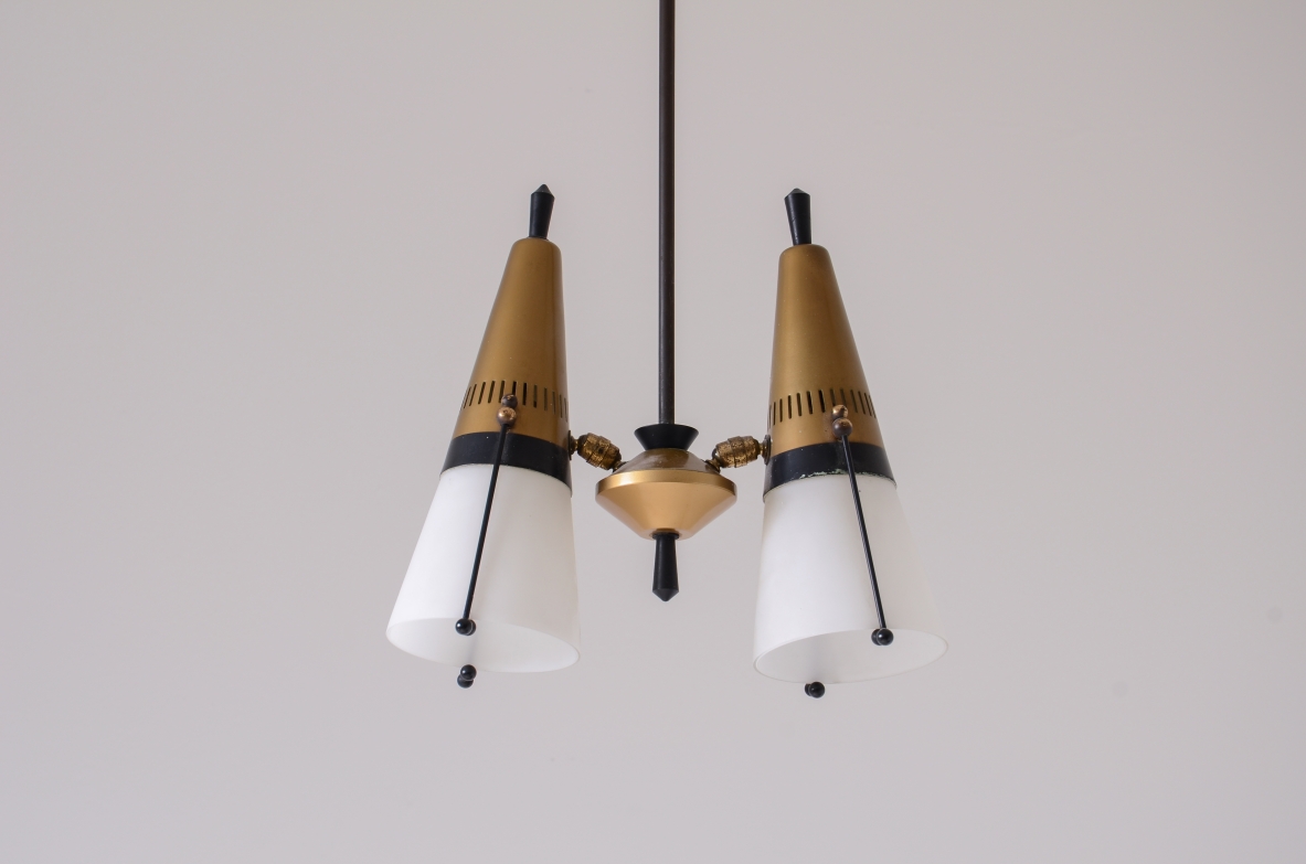 Small Italian two-light chandelier, featuring a dark metal central stem, brass arms and two conical white opaline glass shades with brass upper fittings.