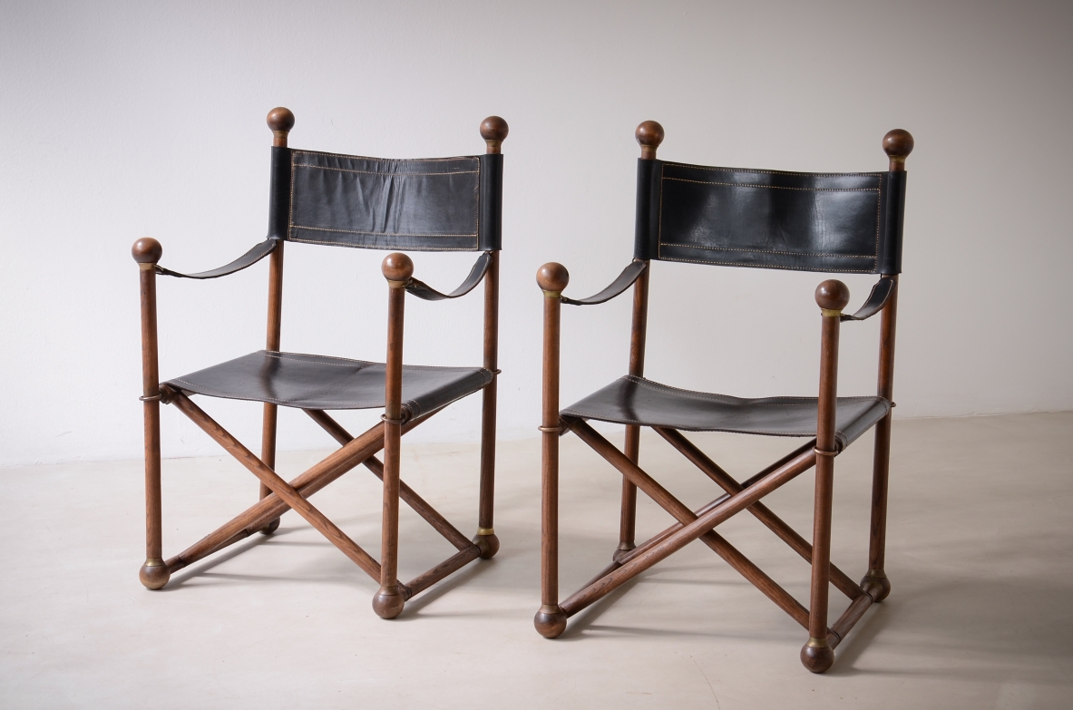 pair of turned wood folding chairs with leather seat, Pierre Lottier for Valenti. Spain 40's