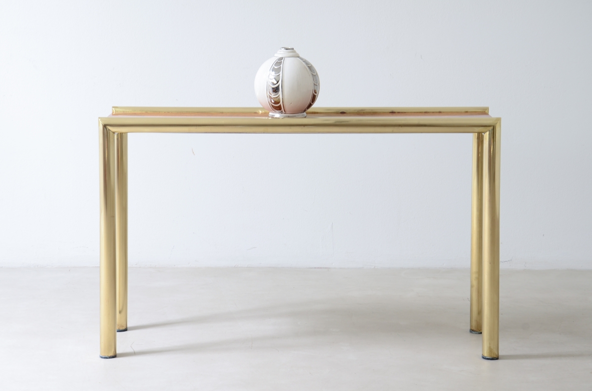 Console table with rectangular brass frame, straight legs and burl wood top.